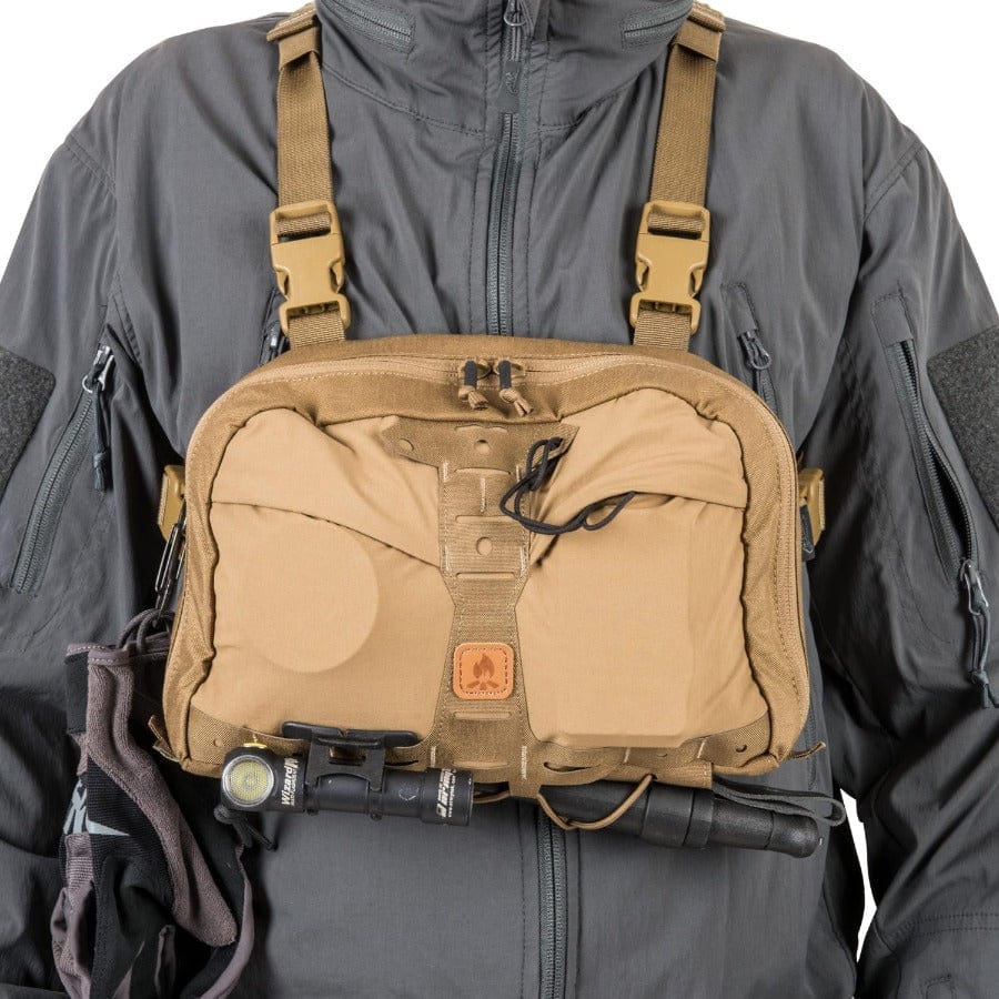 Chest pack outlet for backpacking